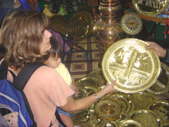 Burchie looking at brass plates